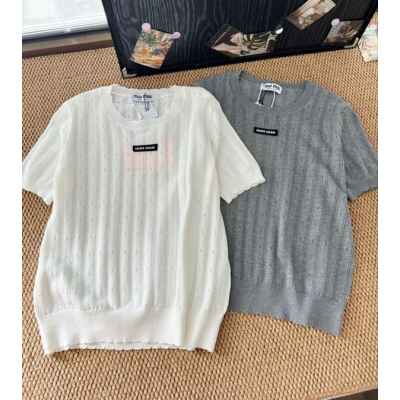 미*** 25 로고패치 펀칭 니트  수입