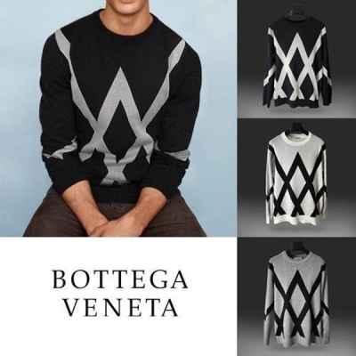 보** 사선 라운드 니트